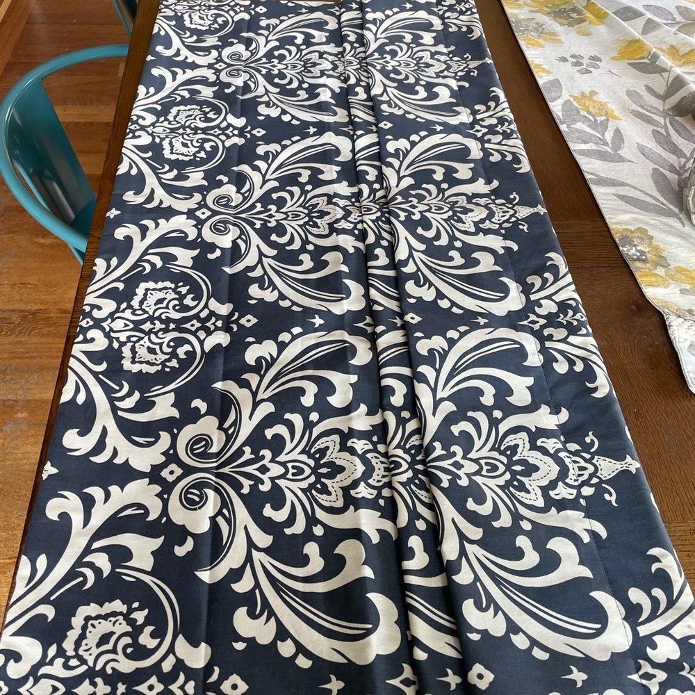 Blue and white kitchen curtains.
